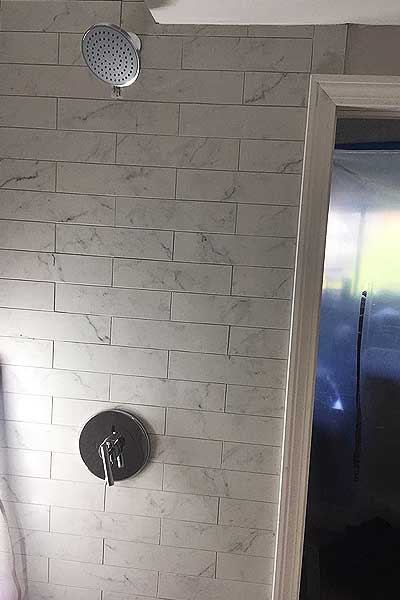 argentlewiswharfcondoremondelbathroomtileboston | Argent Construction Company